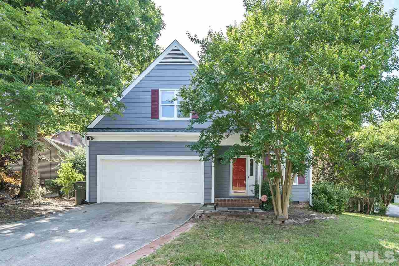 4500 Knightsbridge Way Raleigh, NC 27604 - Photo 1 of 24 a front view of a house with a yard and tree
