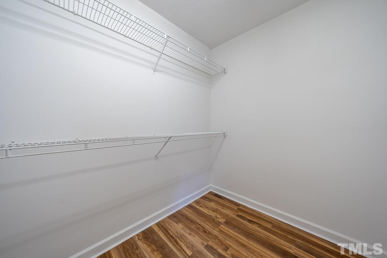 4500 Knightsbridge Way Raleigh, NC 27604 - Photo 14 of 24 a view of a room with racks on the wall