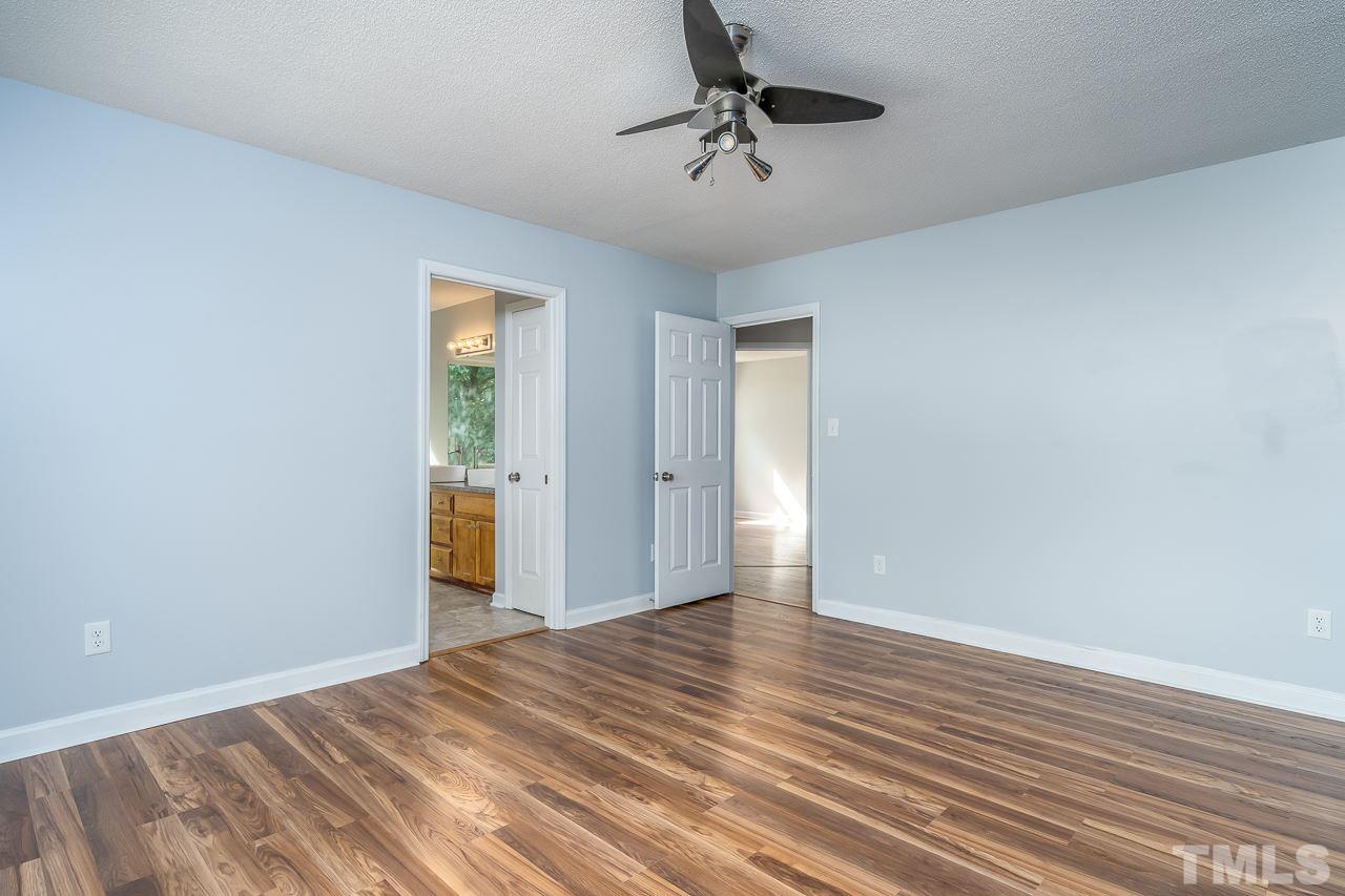 4500 Knightsbridge Way Raleigh, NC 27604 - Photo 7 of 24 a view of empty room with wooden floor