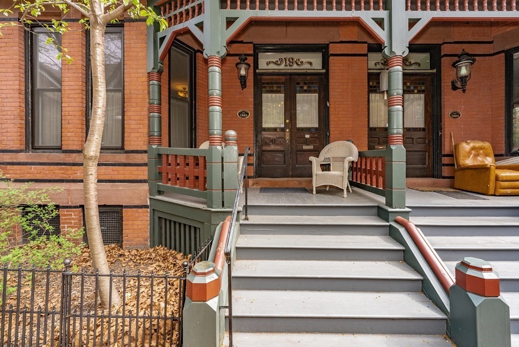 a view of building with a outdoor seating space