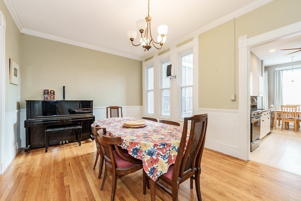 19 Mattoon Street Springfield, MA 01105 - Photo 12 of 42 a dining room with wooden floor and breakfast area