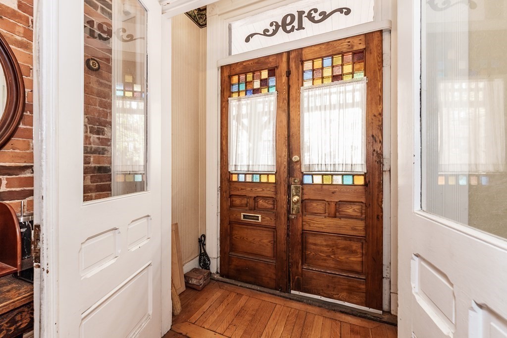 19 Mattoon Street Springfield, MA 01105 - Photo 4 of 42 a view of front door with wooden floor