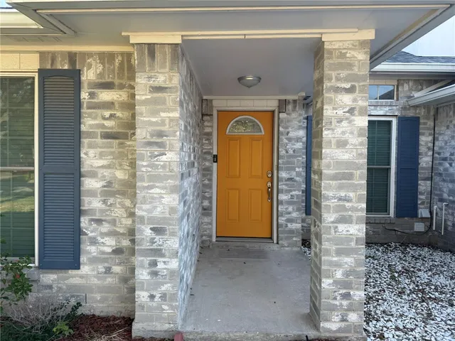 a front view of a house with a shower
