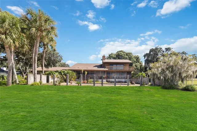 a view of a building with a big yard