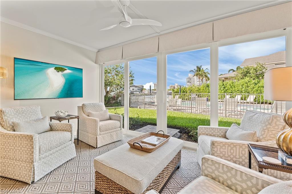 4155 Crayton Road, Unit 107 Naples, FL 34103 - Photo 8 of 36 Sunroom / solarium with ceiling fan
