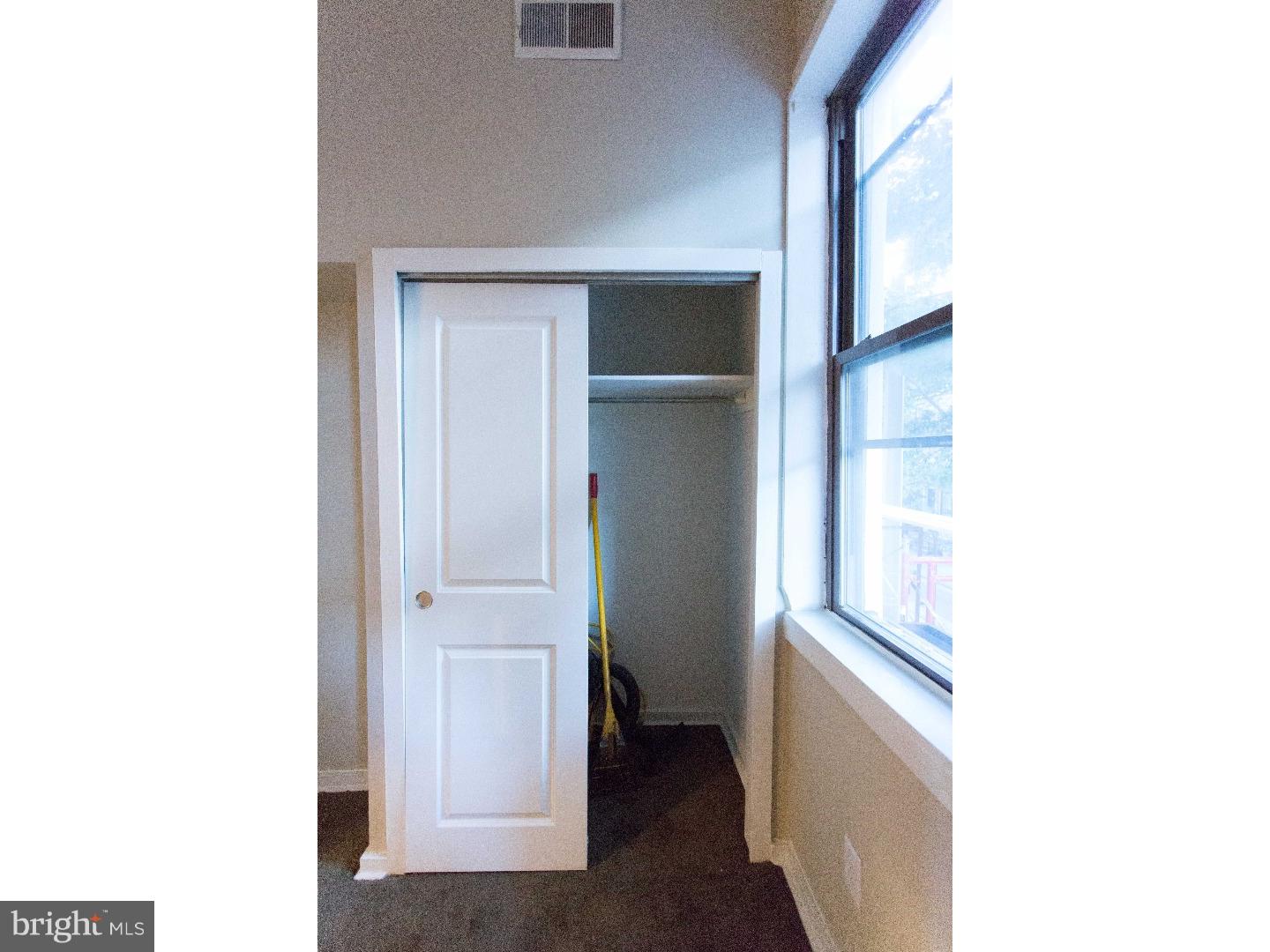 413 South 11th Street, Unit 3F Philadelphia, PA 19147 - Photo 15 of 15 a view of an empty room with closet
