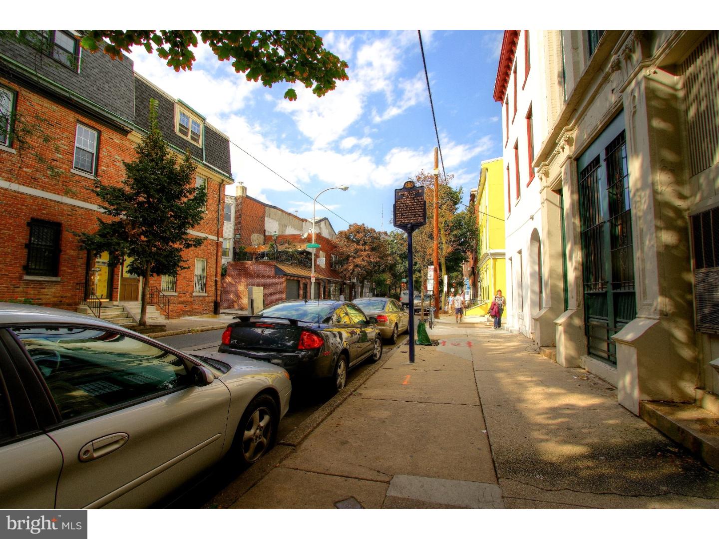413 South 11th Street, Unit 3F Philadelphia, PA 19147 - Photo 2 of 15 a view of a cars park in front of a building
