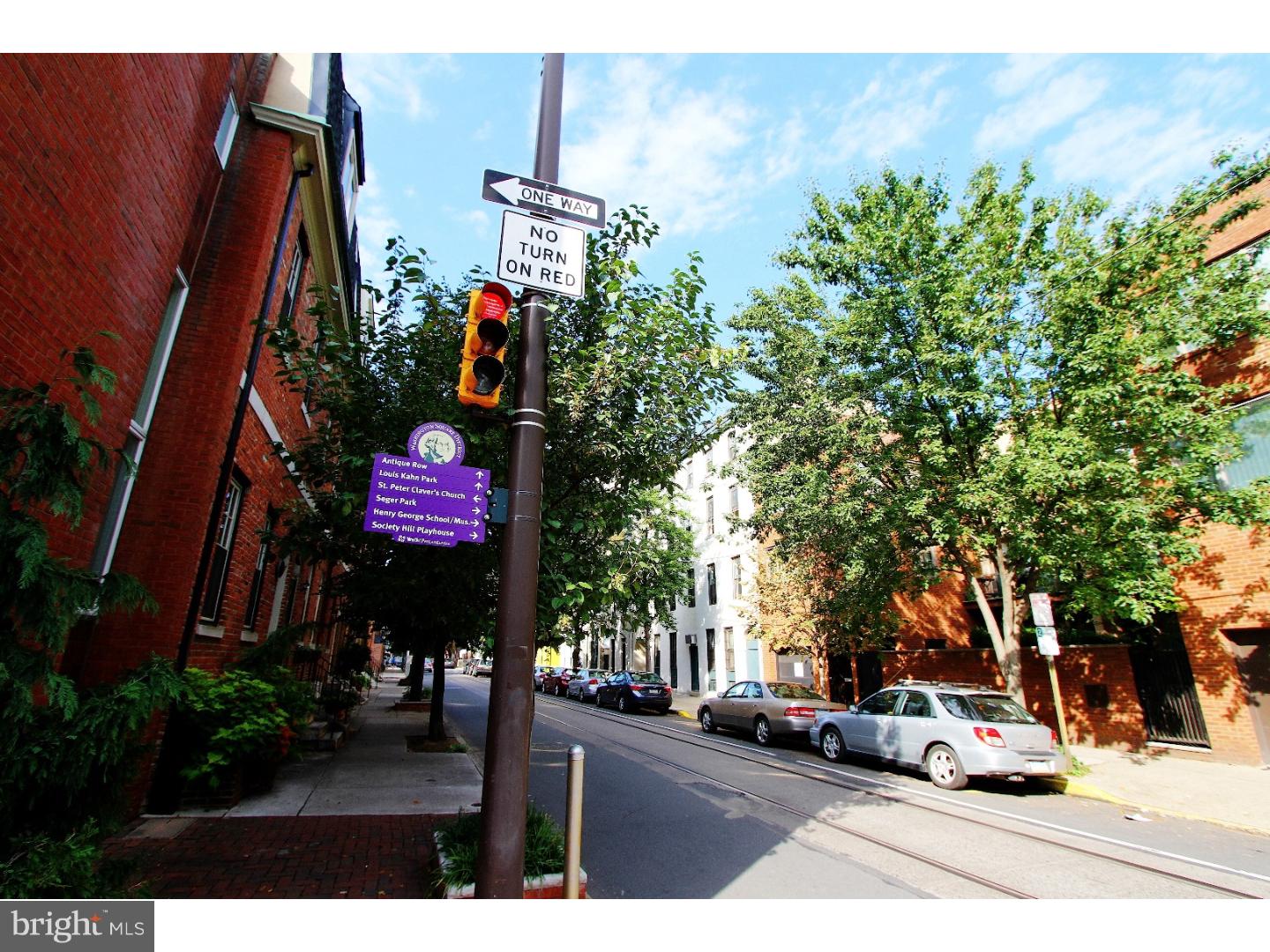 413 South 11th Street, Unit 3F Philadelphia, PA 19147 - Photo 3 of 15 a view of street with parked cars