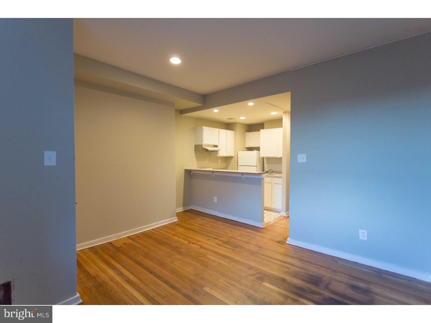 413 South 11th Street, Unit 3F Philadelphia, PA 19147 - Photo 5 of 15 a view of kitchen with wooden floor