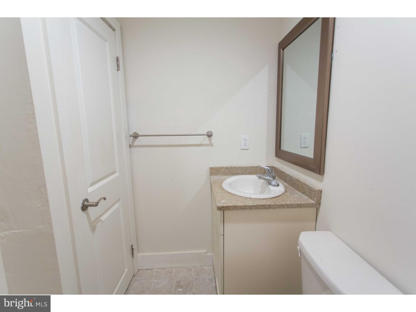 413 South 11th Street, Unit 3F Philadelphia, PA 19147 - Photo 10 of 15 a bathroom with a sink and a mirror