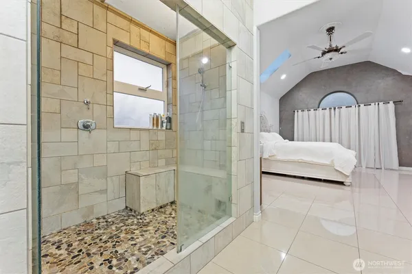 a bathroom with a sink and a shower