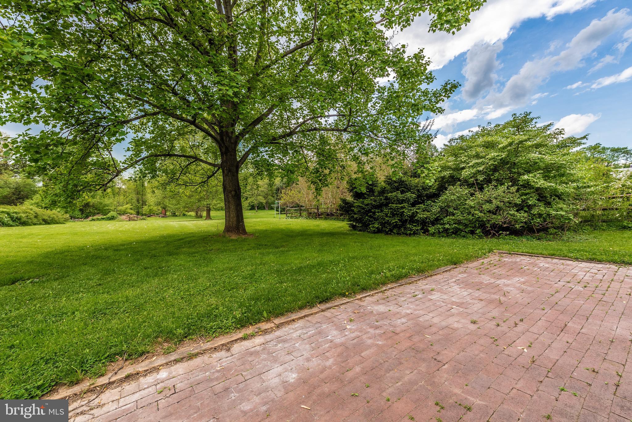 7832 Rocky Springs Road Frederick, MD 21702 - Photo 33 of 41 Large paver patio overlooking yard.