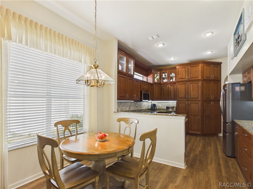 42 Byrsonima Loop Homosassa, FL 34446 - Photo 18 of 50 BREAKFAST NOOK 1 WITH VIEW ON THE KITCHEN