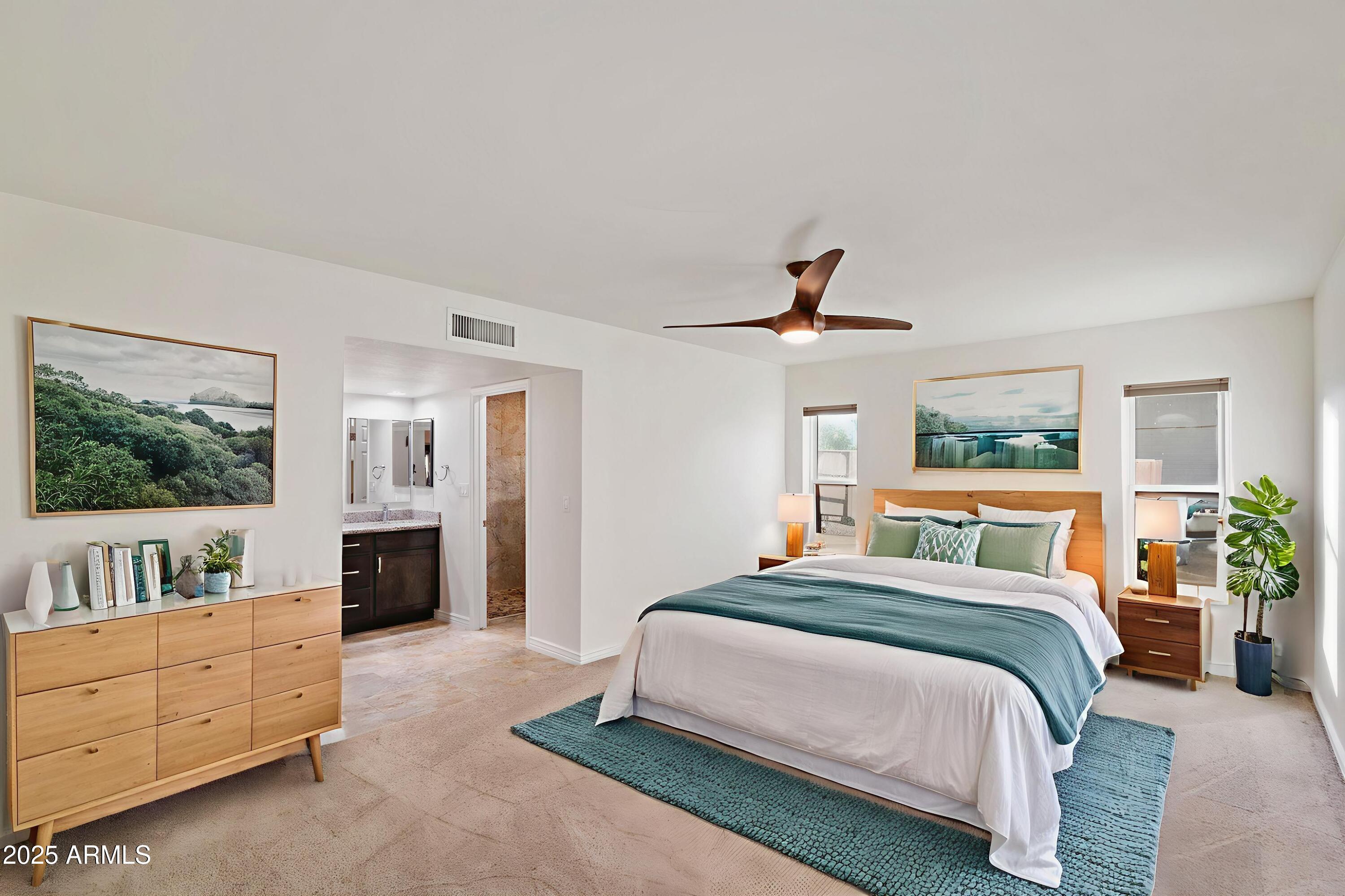 6242 East Hearn Road Scottsdale, AZ 85254 - Photo 18 of 40 a bedroom with a large bed and a window
