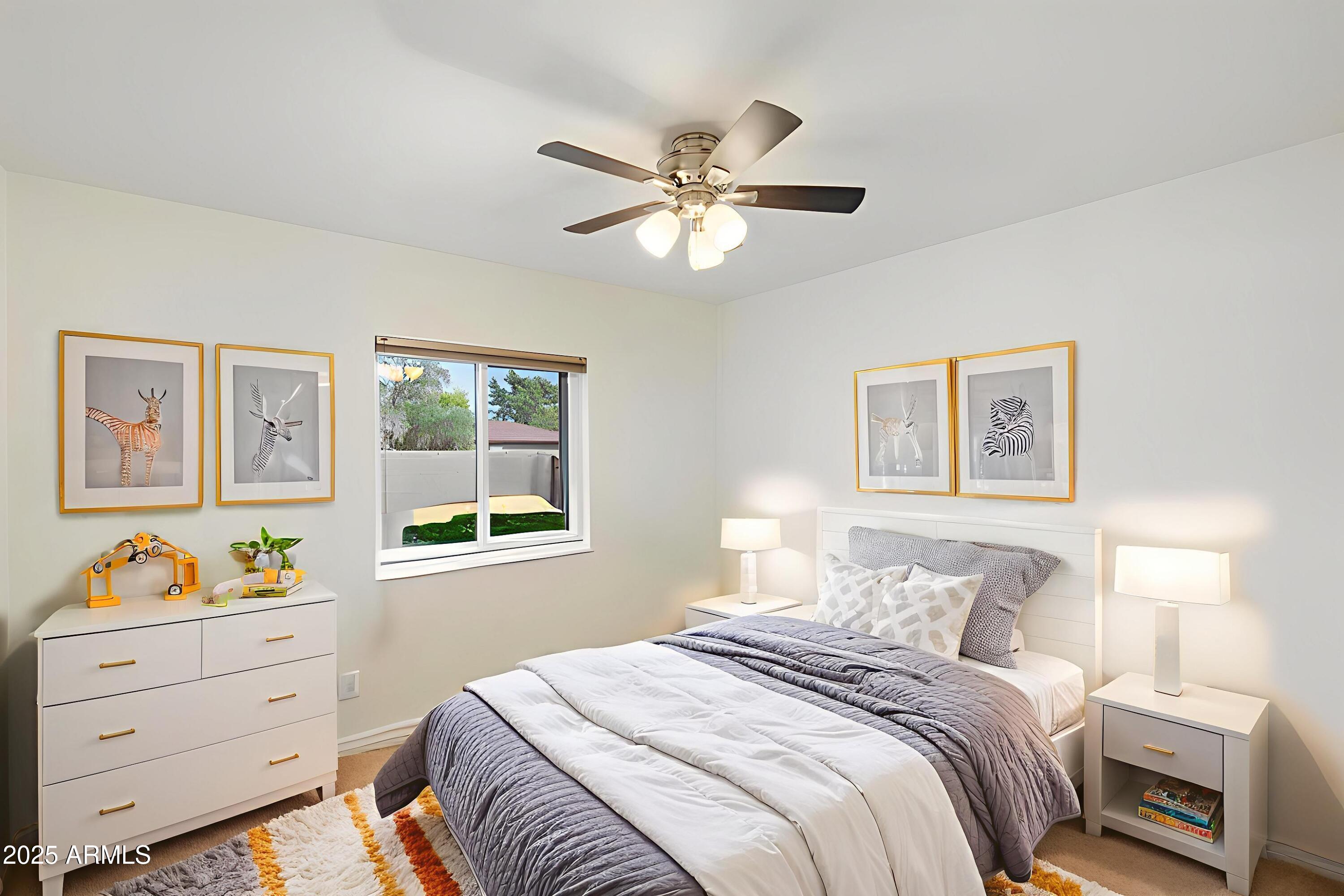 6242 East Hearn Road Scottsdale, AZ 85254 - Photo 22 of 40 a bedroom with a bed and a window