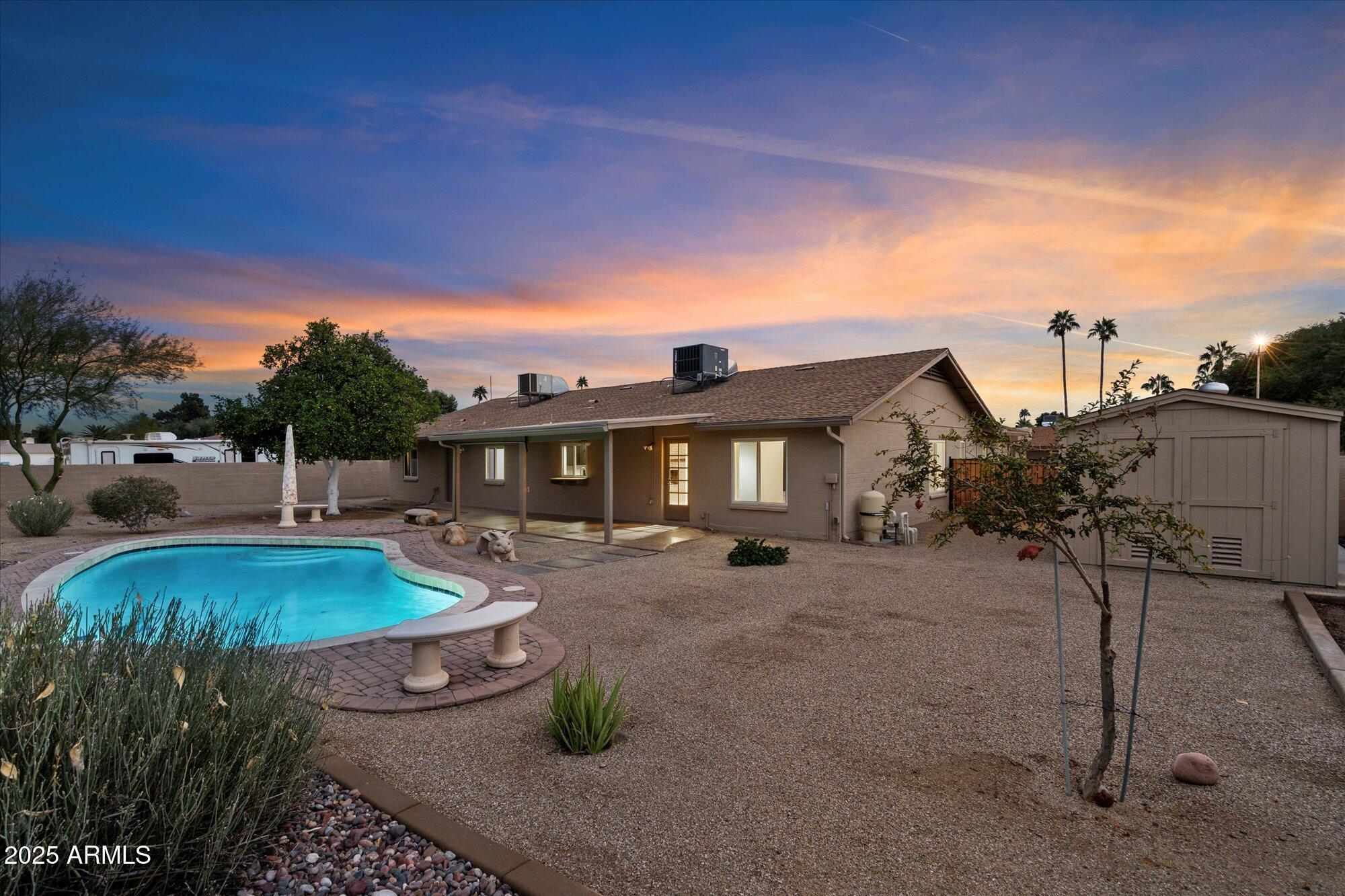 6242 East Hearn Road Scottsdale, AZ 85254 - Photo 33 of 40 a front view of house with yard and outdoor seating
