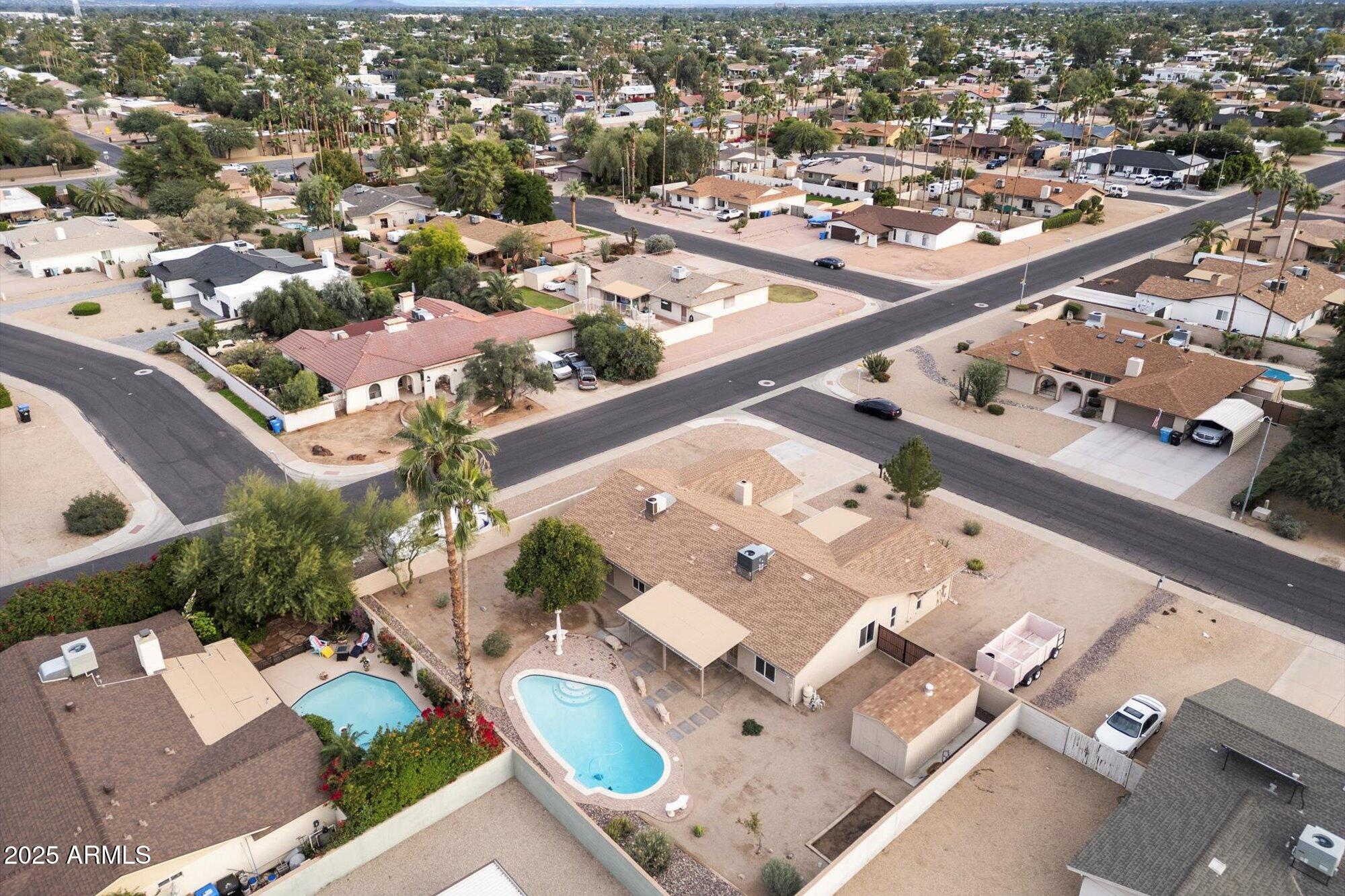 6242 East Hearn Road Scottsdale, AZ 85254 - Photo 36 of 40 an aerial view of residential houses with outdoor space