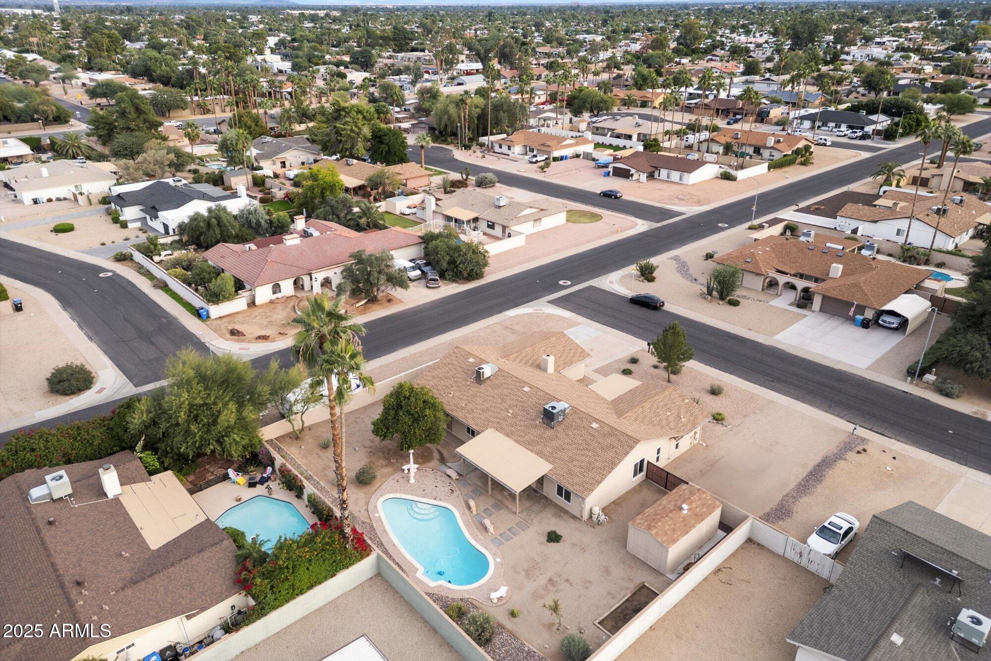6242 East Hearn Road Scottsdale, AZ 85254 - Photo 38 of 40 an aerial view of residential houses with outdoor space