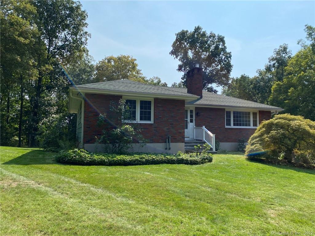 199 County Road Guilford, CT 06437 - Photo 1 of 1 Brick front of the house with new roof and specimen maple tree.