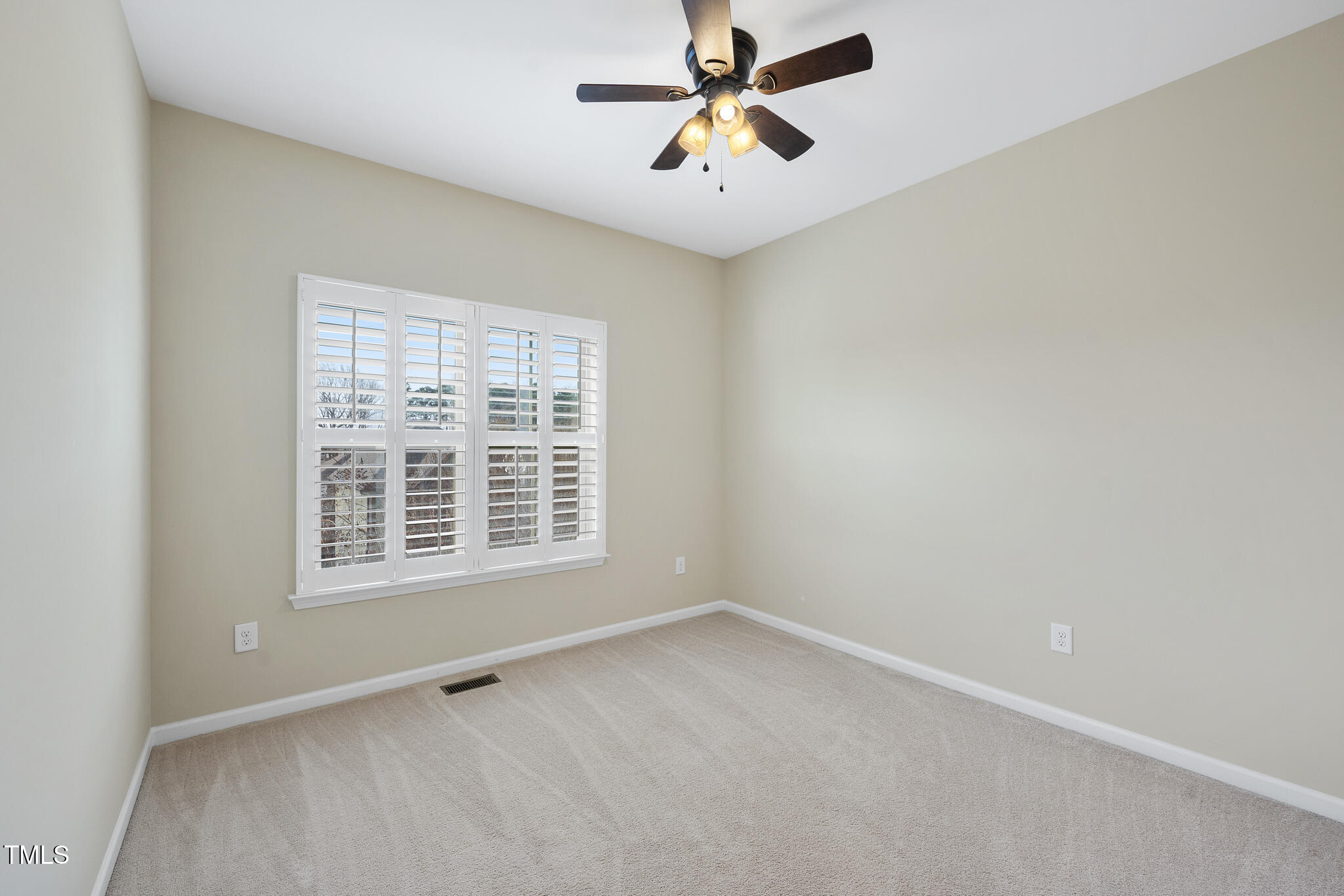 1319 Rodessa Run Raleigh, NC 27607 - Photo 24 of 34 a view of an empty room with a window