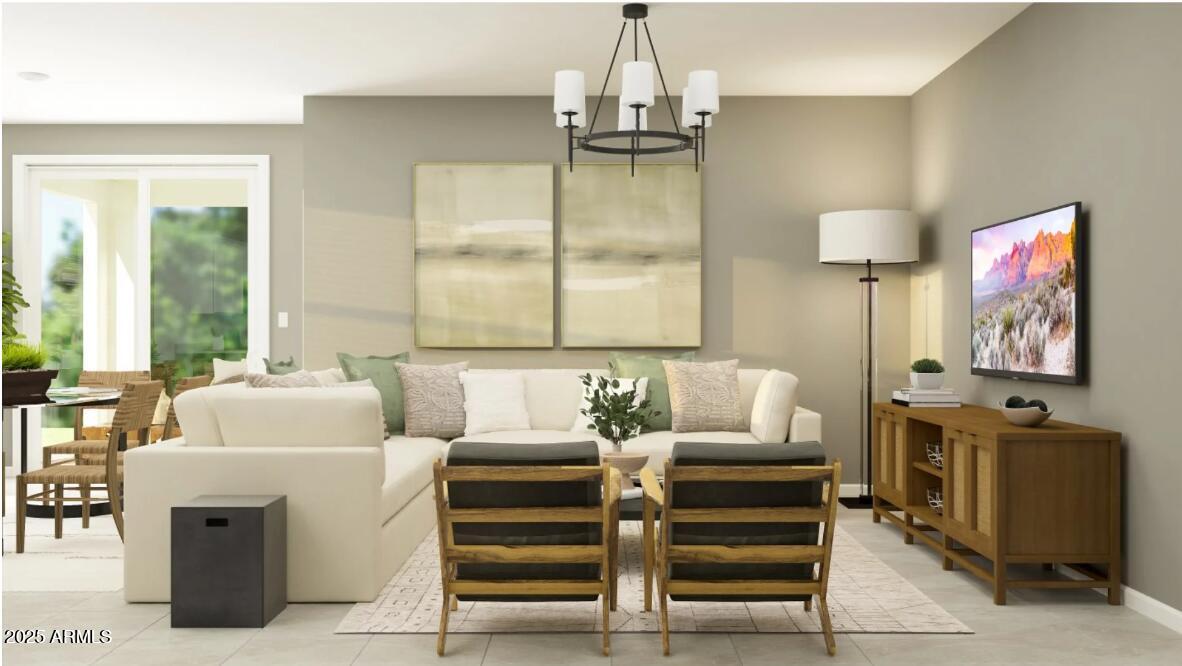 14955 West Hackamore Drive Surprise, AZ 85387 - Photo 4 of 19 a living room with furniture a flat screen tv and a window