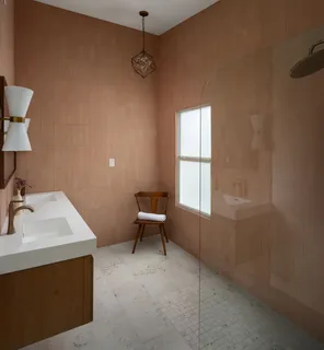 a bathroom with a sink toilet and mirror