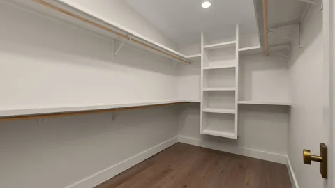 a view of an empty walk in closet