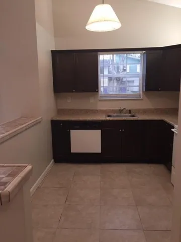 a room with furniture and a flat screen tv