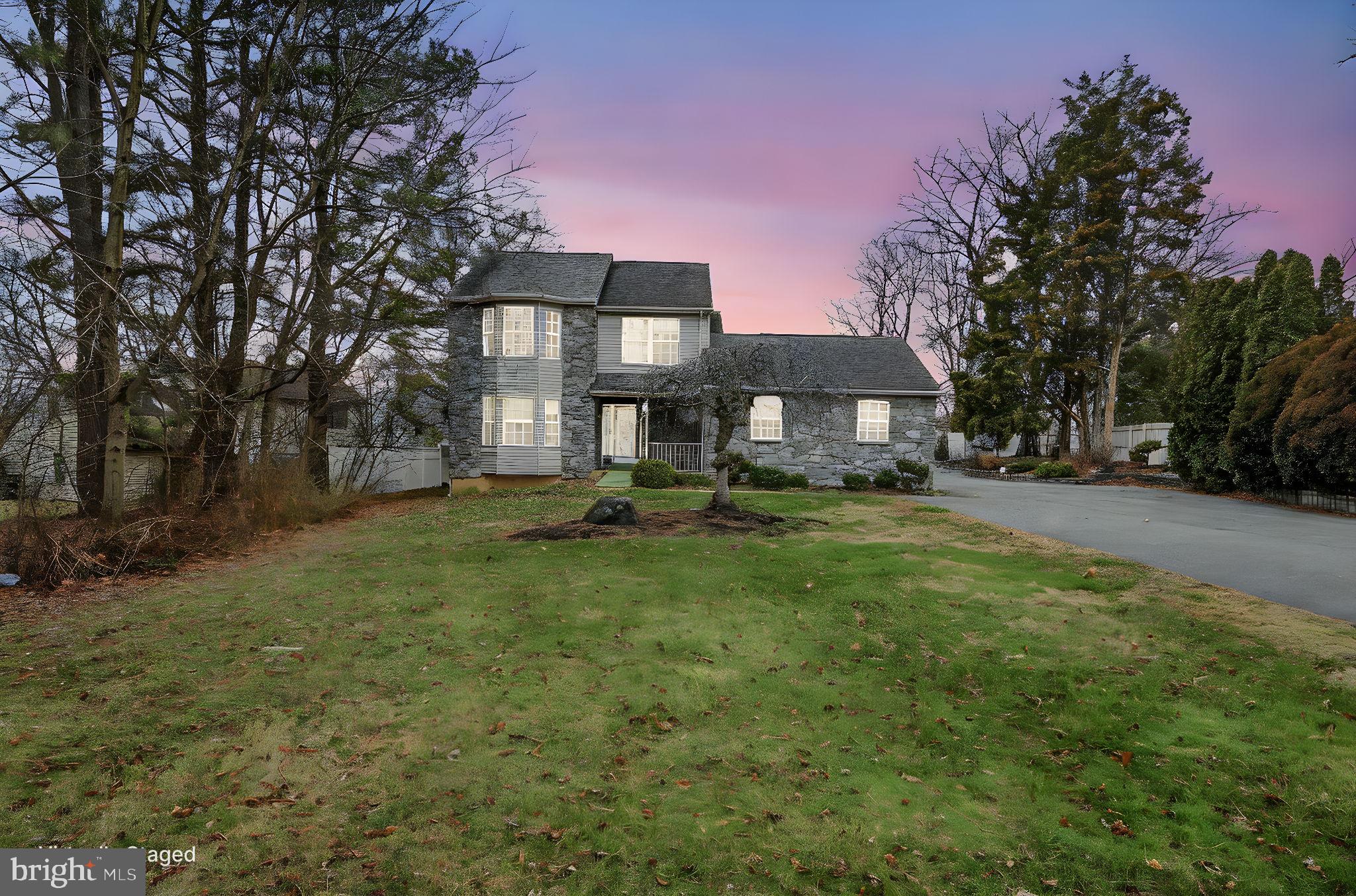 346 Bear Christiana Road Bear, DE 19701 - Photo 4 of 35 a front view of a house with yard and green space