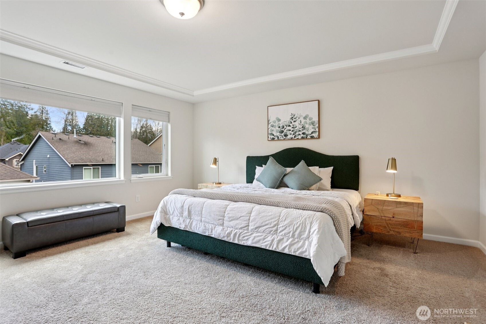 14025 163rd Place Southeast Renton, WA 98059 - Photo 12 of 33 a spacious bedroom with a bed and a couch