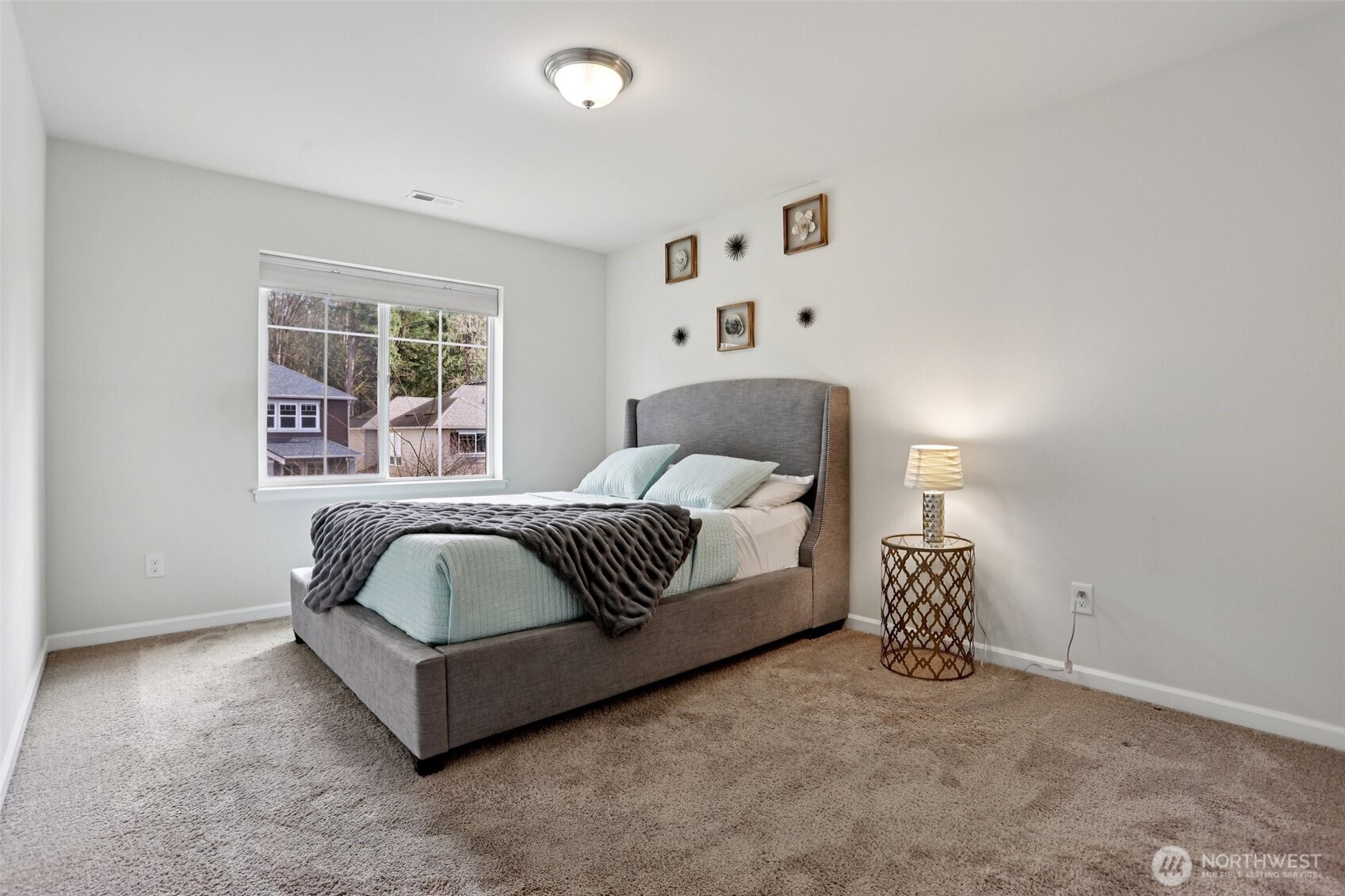 14025 163rd Place Southeast Renton, WA 98059 - Photo 16 of 33 a bedroom with a bed and window