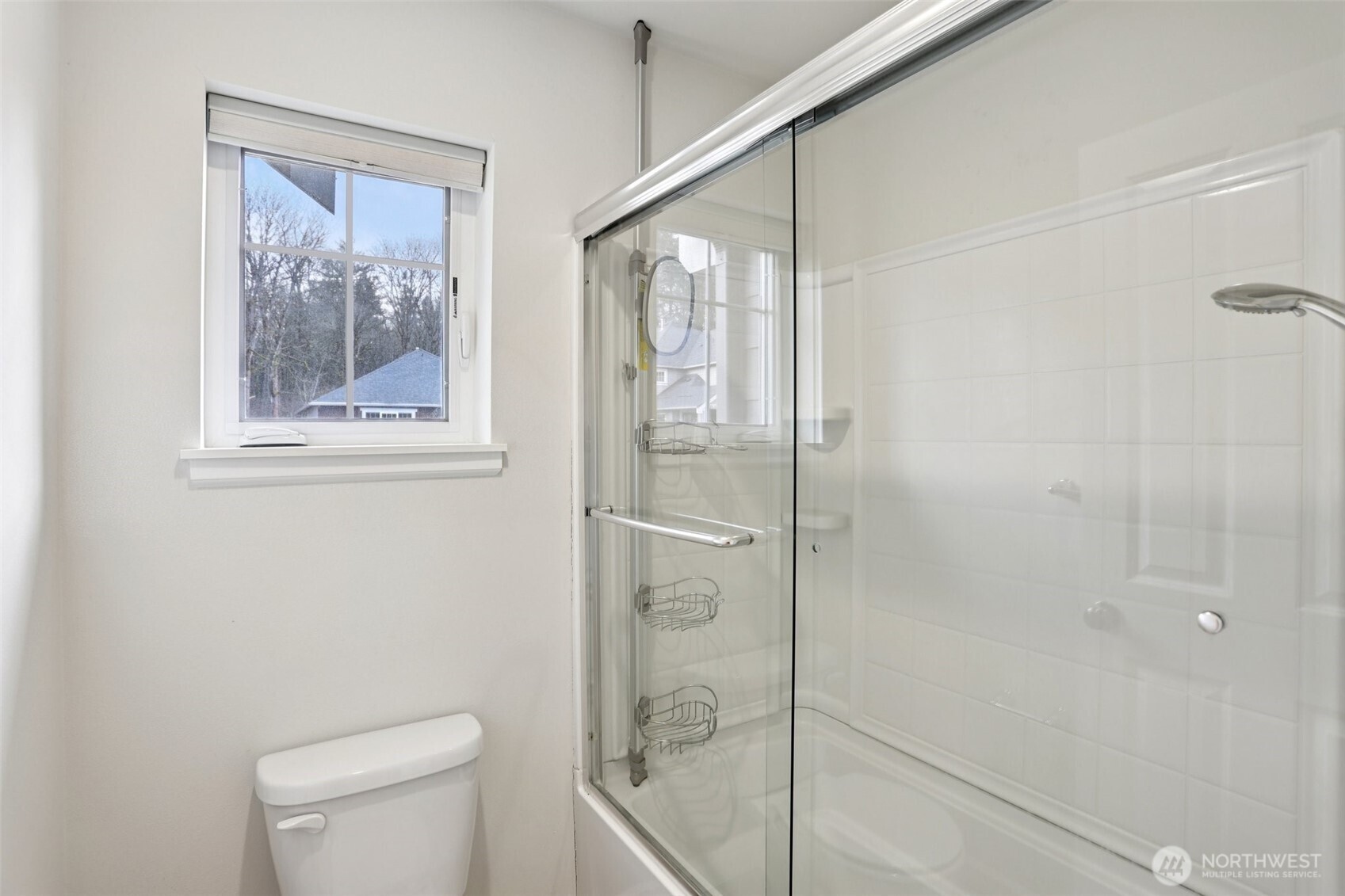 14025 163rd Place Southeast Renton, WA 98059 - Photo 18 of 33 a bathroom with a shower and toilet