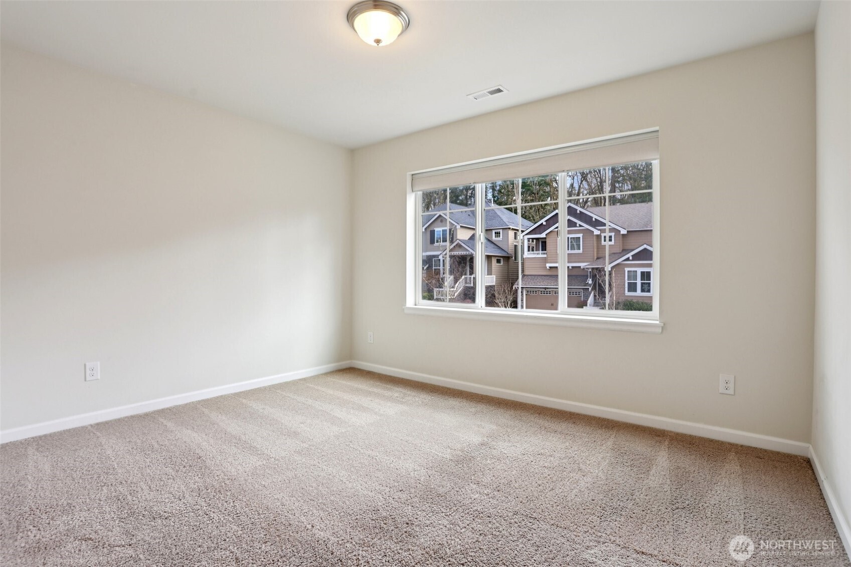 14025 163rd Place Southeast Renton, WA 98059 - Photo 19 of 33 an empty room with windows