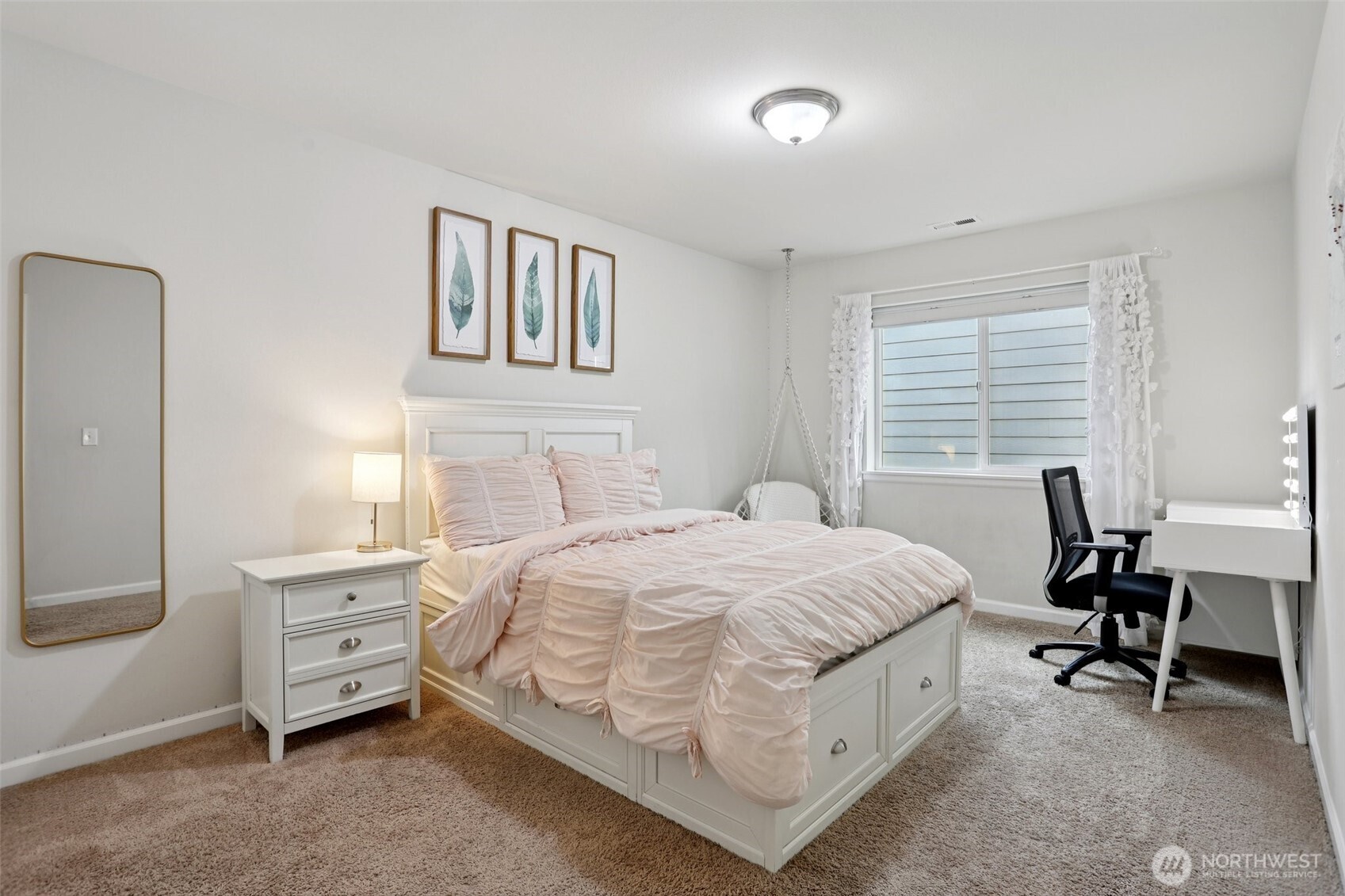 14025 163rd Place Southeast Renton, WA 98059 - Photo 20 of 33 a bedroom with a bed a table and a window