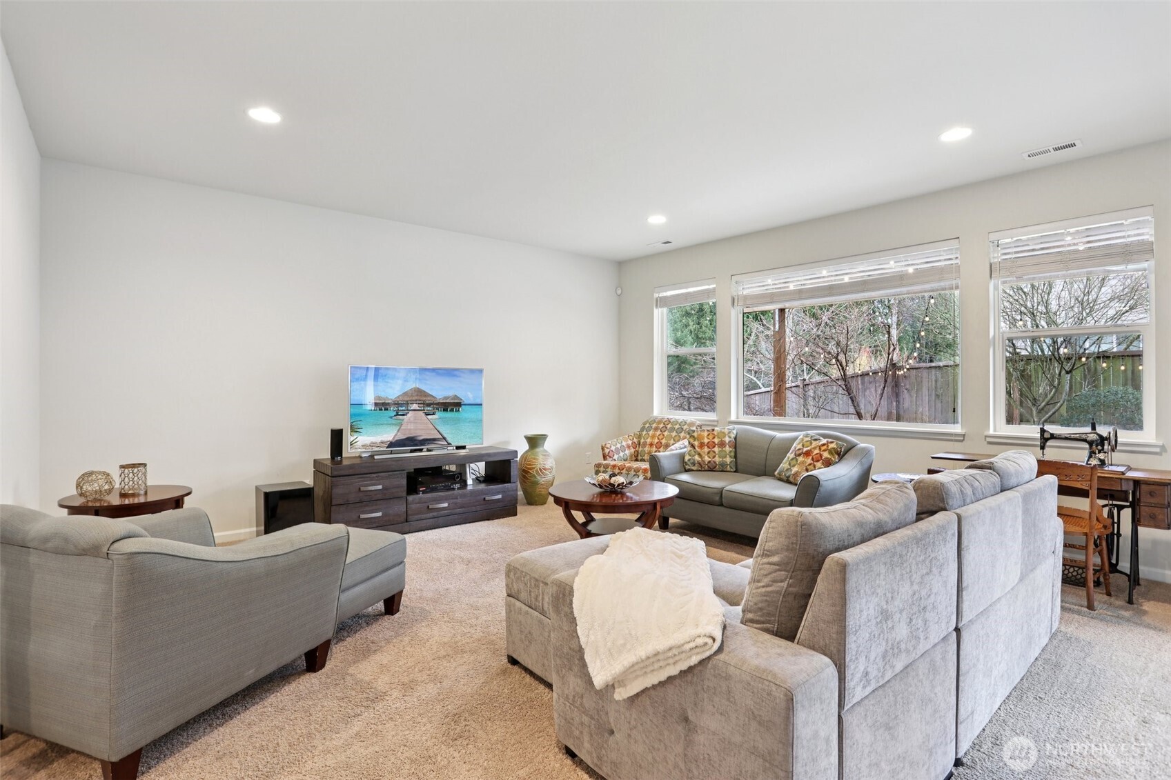 14025 163rd Place Southeast Renton, WA 98059 - Photo 22 of 33 a living room with furniture and a large window