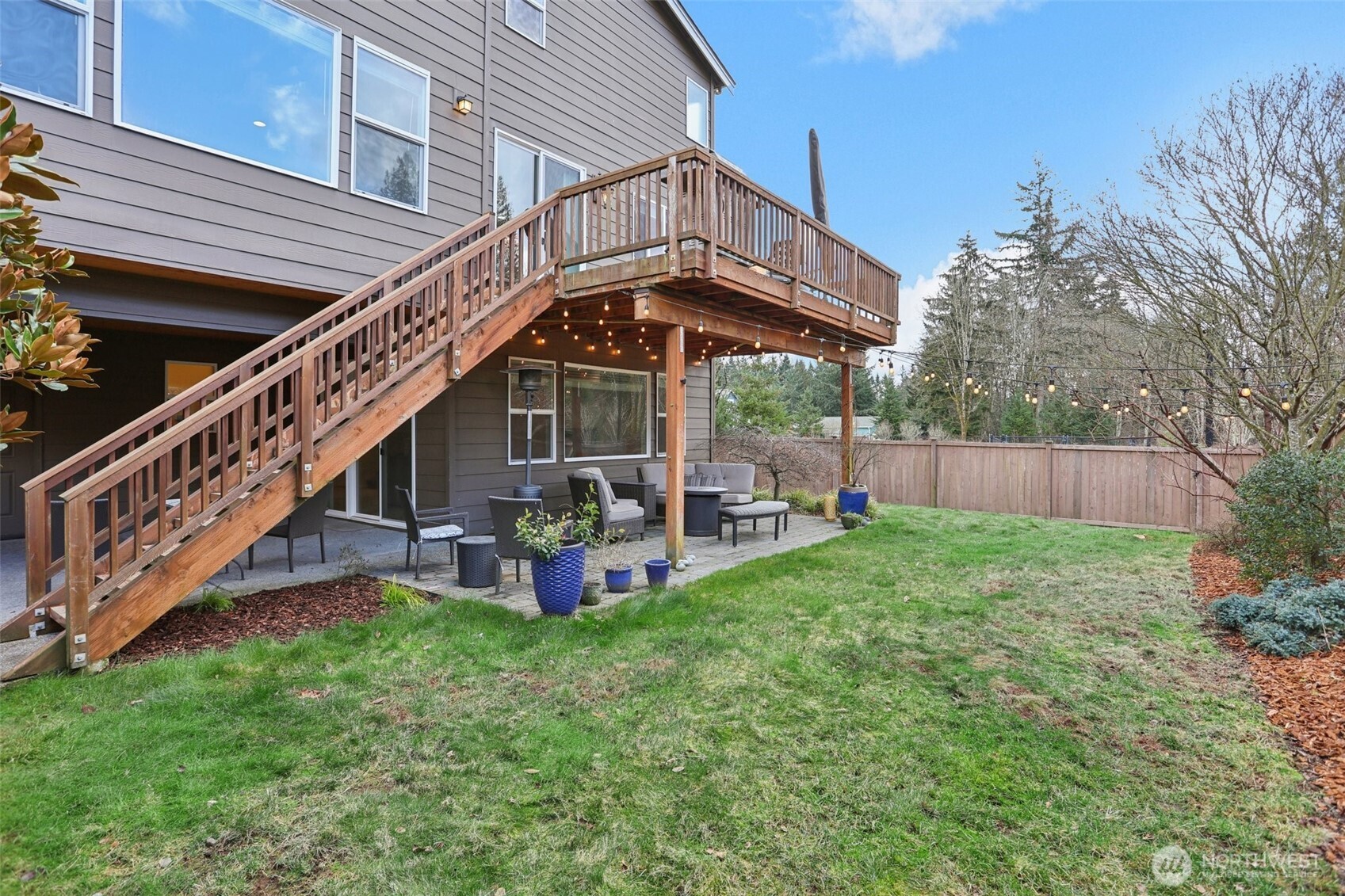 14025 163rd Place Southeast Renton, WA 98059 - Photo 27 of 33 a view of a house with backyard and sitting area