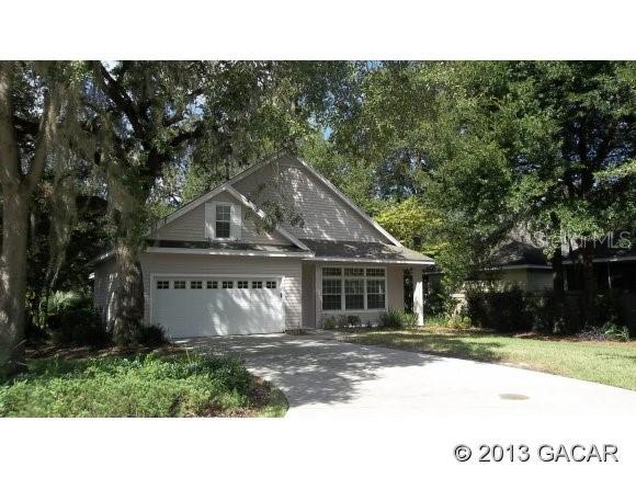 3536 Southwest 98th Boulevard Gainesville, FL 32608 - Photo 1 of 1 a view of a house with a yard