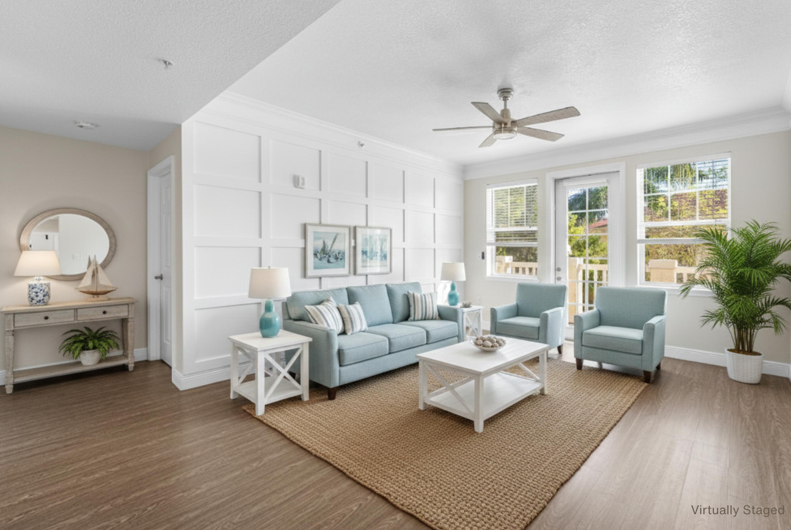 276 Murcia Drive, Unit 301 Jupiter, FL 33458 - Photo 1 of 52 a living room with furniture and wooden floor