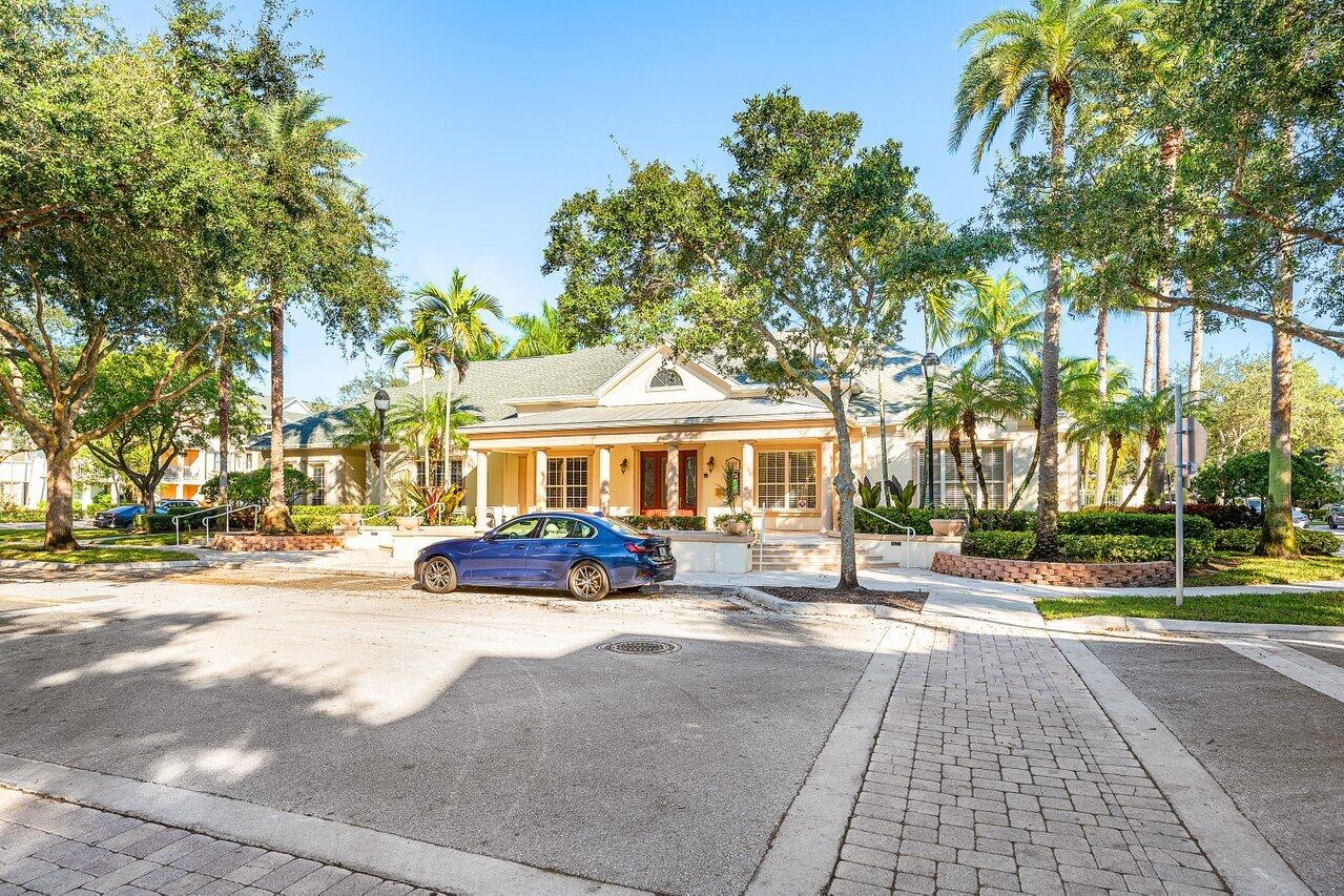276 Murcia Drive, Unit 301 Jupiter, FL 33458 - Photo 36 of 52 a front view of a building with street view
