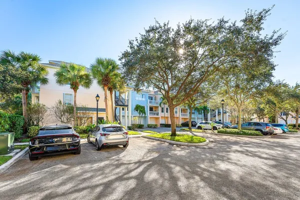 a view of a street with cars