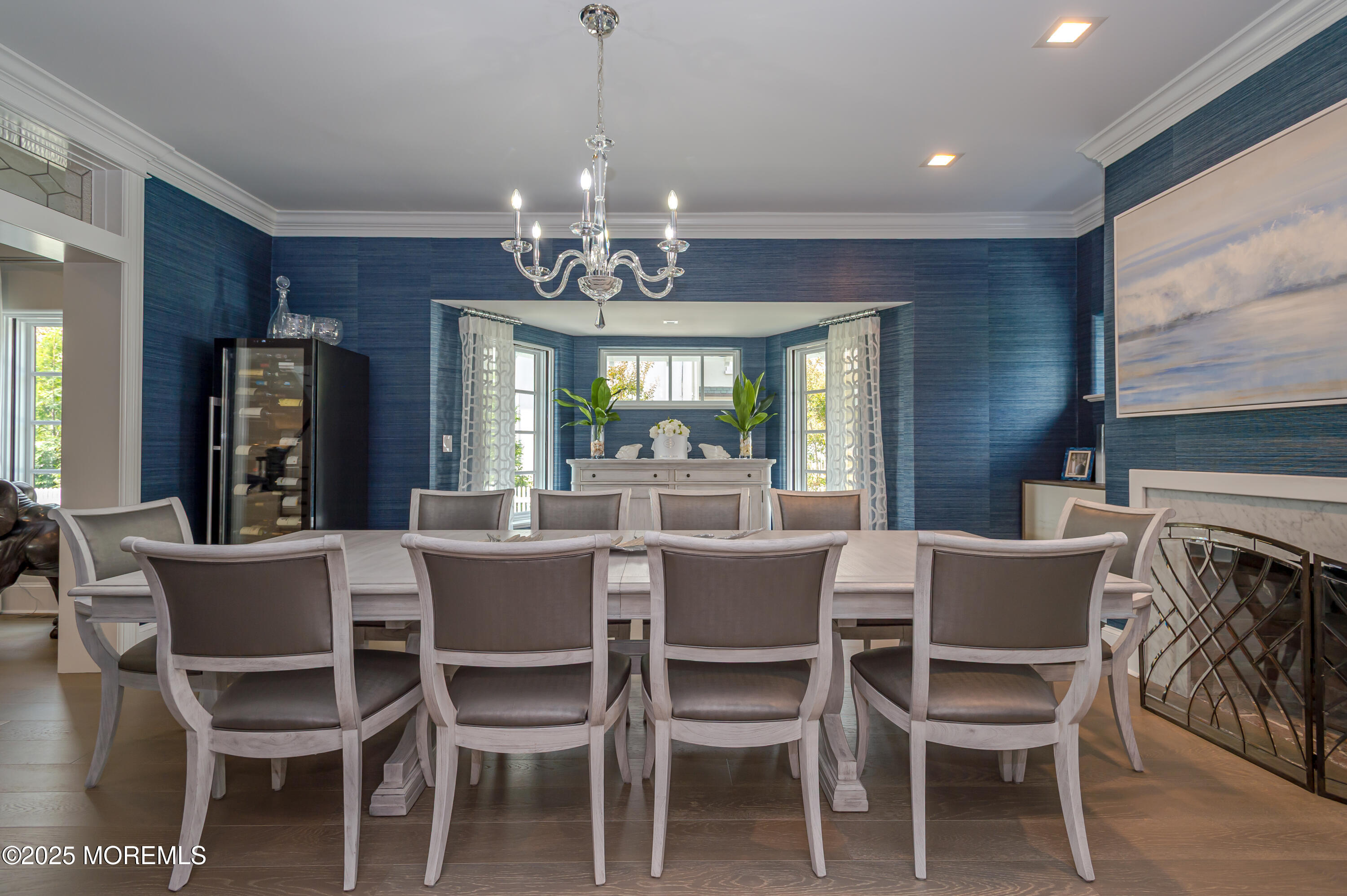 112 Passaic Avenue Spring Lake, NJ 07762 - Photo 15 of 69 a dining room with furniture a chandelier and wooden floor