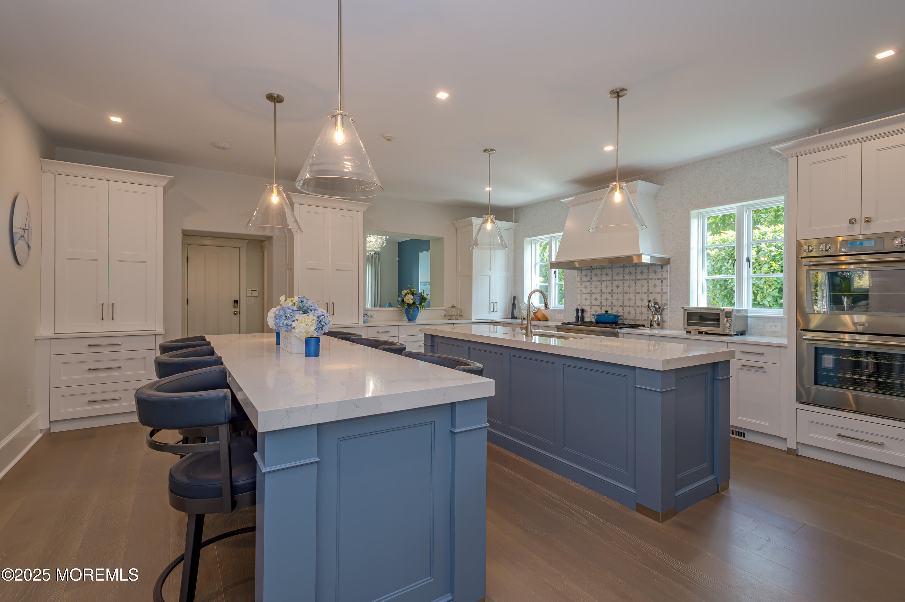 112 Passaic Avenue Spring Lake, NJ 07762 - Photo 17 of 69 a kitchen with stainless steel appliances granite countertop a sink a stove and a wooden floors