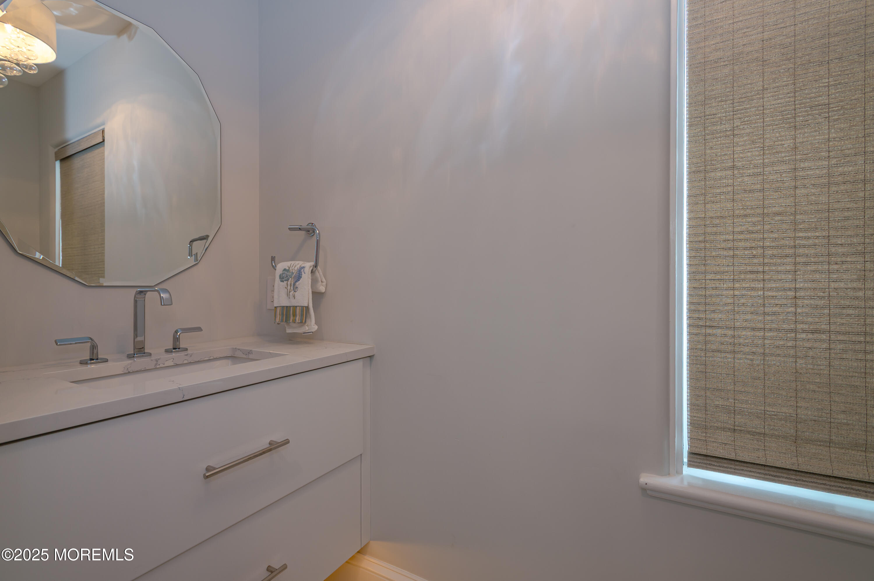 112 Passaic Avenue Spring Lake, NJ 07762 - Photo 20 of 69 a bathroom with a sink and a mirror