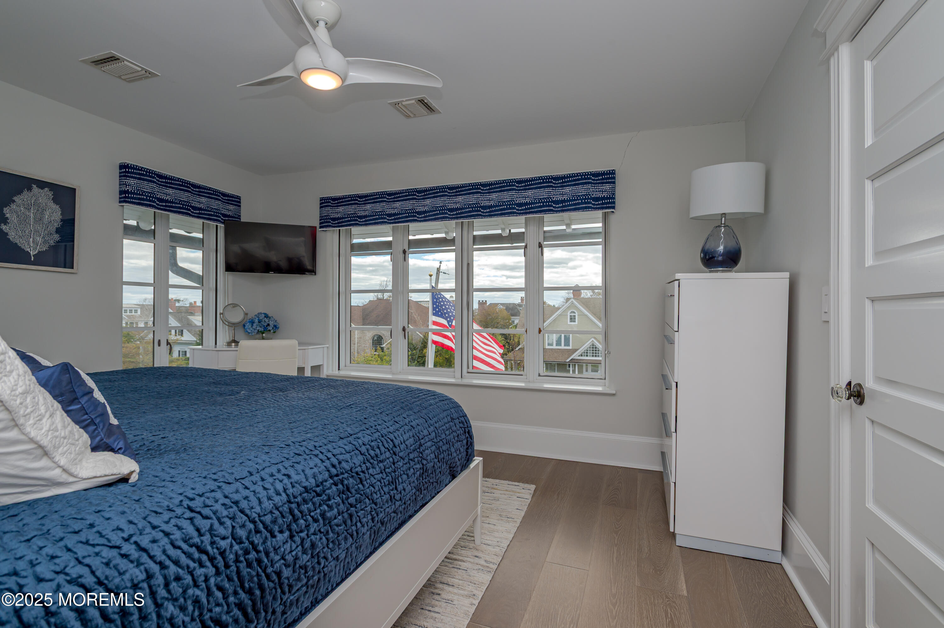 112 Passaic Avenue Spring Lake, NJ 07762 - Photo 37 of 69 a bed room with a bed and a large window