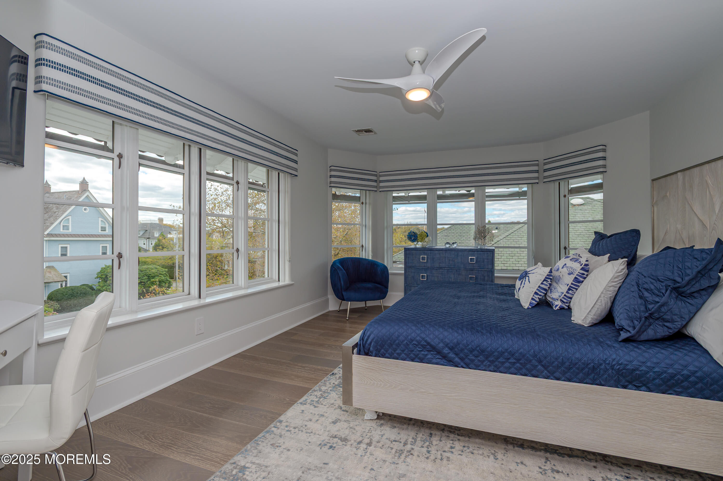 112 Passaic Avenue Spring Lake, NJ 07762 - Photo 40 of 69 a bedroom with a large bed and a large window