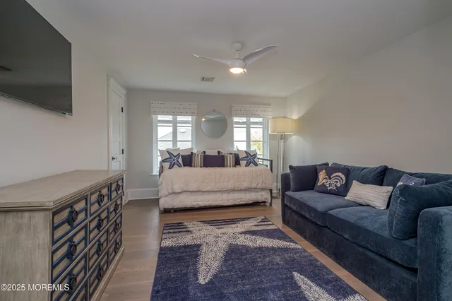 an aerial view of a house with a big yard