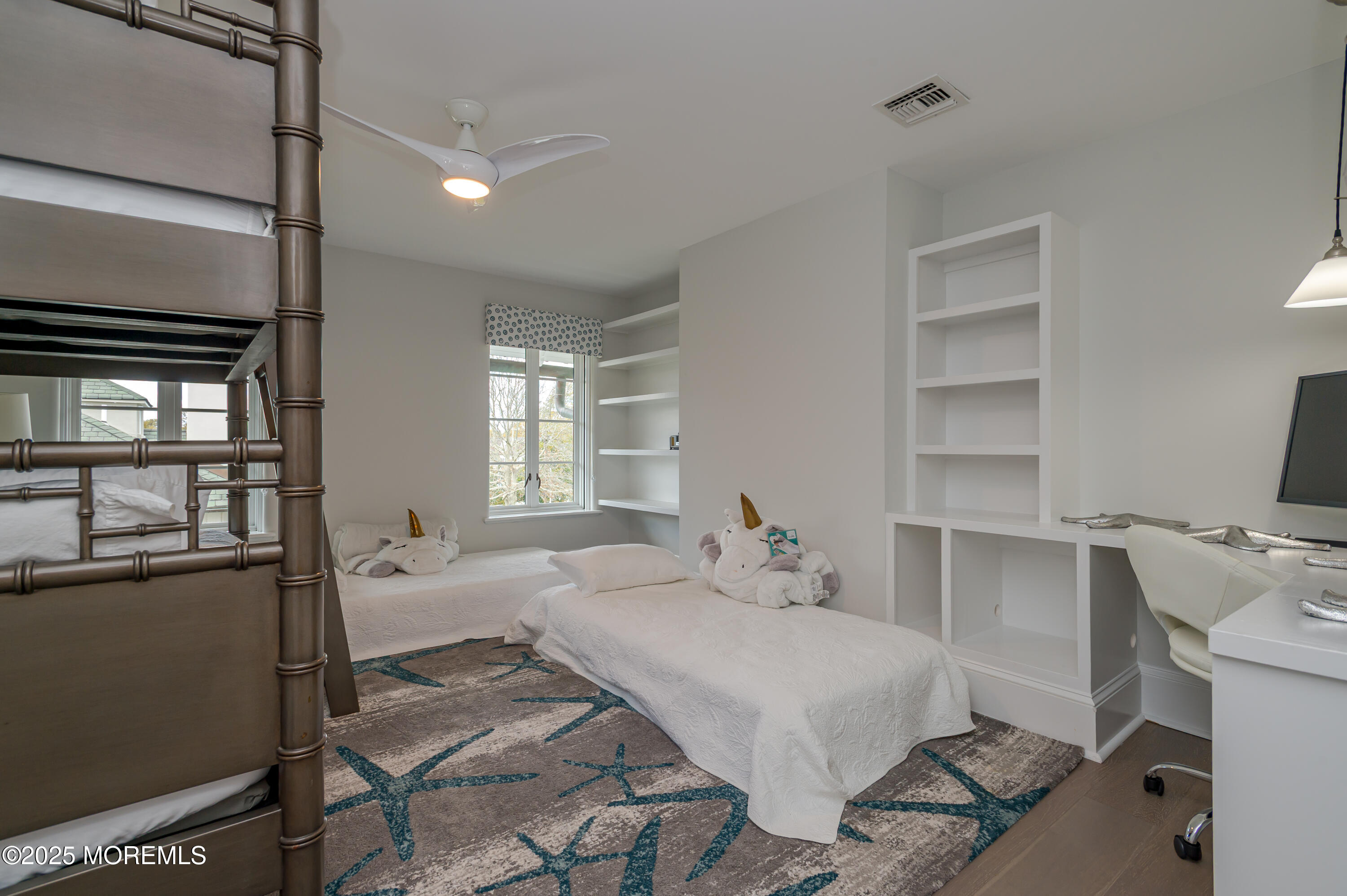 112 Passaic Avenue Spring Lake, NJ 07762 - Photo 43 of 69 a bedroom with a bed and a desk