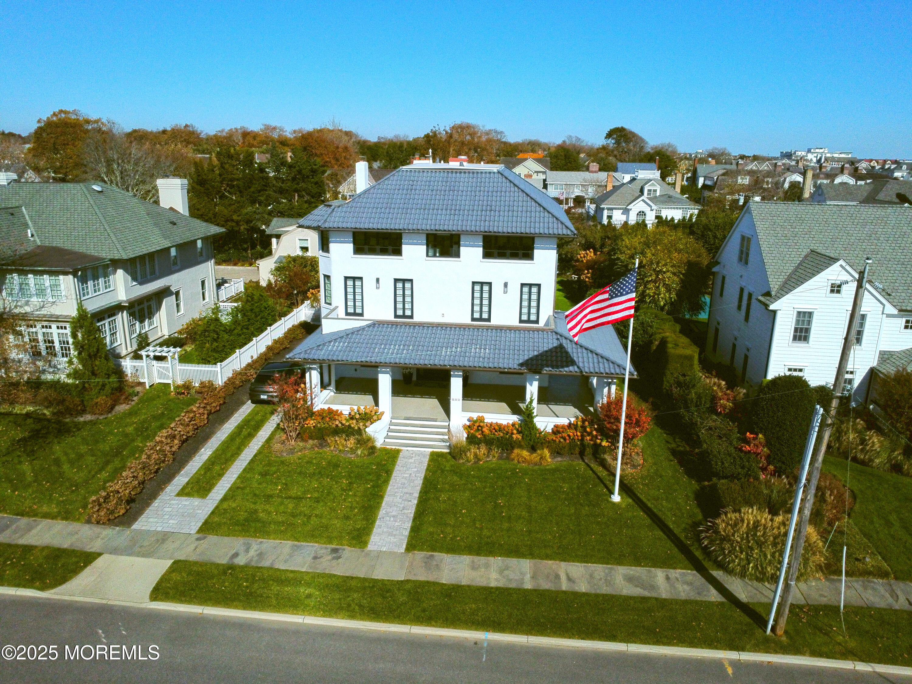 112 Passaic Avenue Spring Lake, NJ 07762 - Photo 55 of 69 a front view of a house with a yard