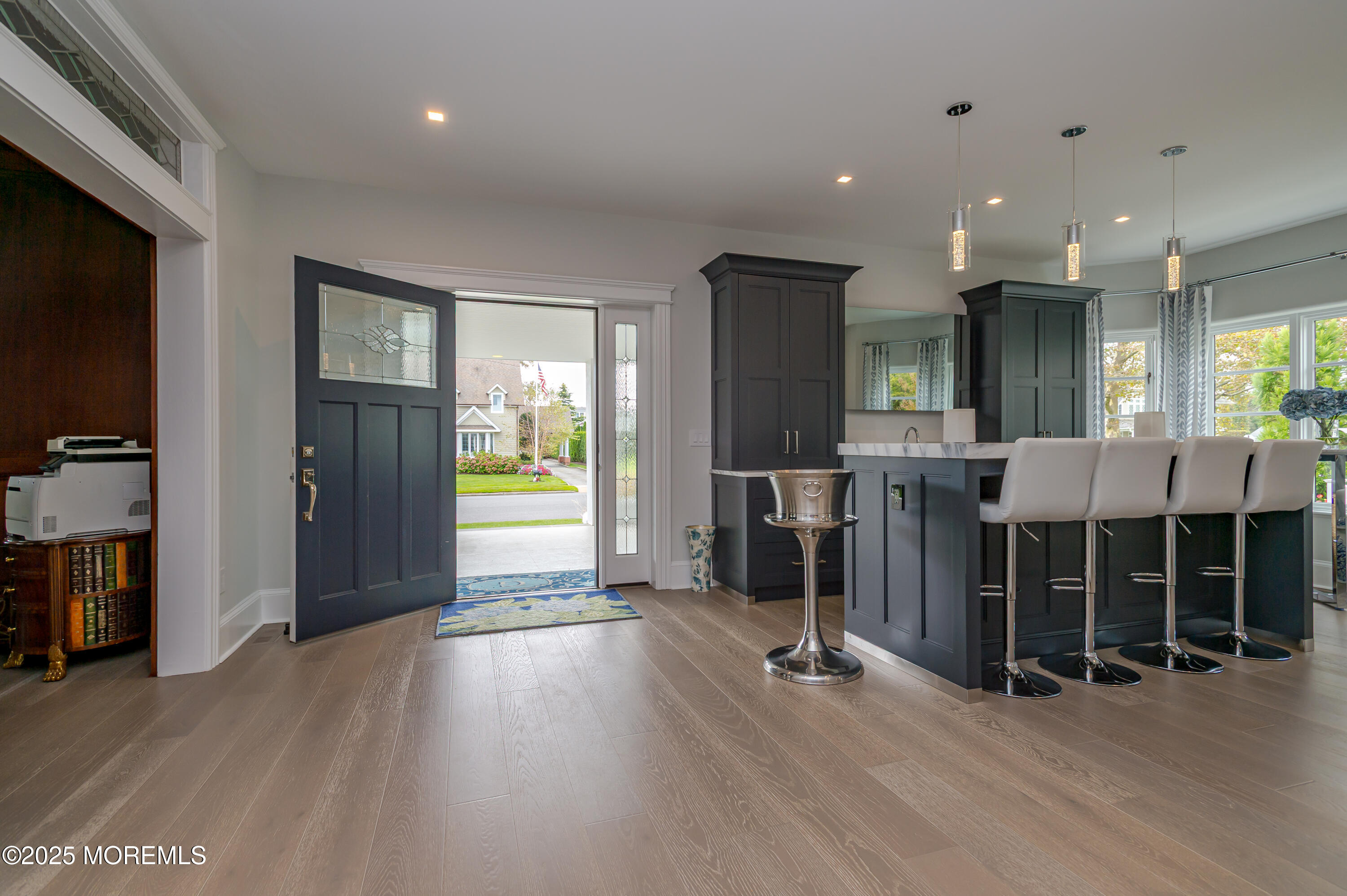 112 Passaic Avenue Spring Lake, NJ 07762 - Photo 6 of 69 a view of a livingroom with furniture and a flat screen tv
