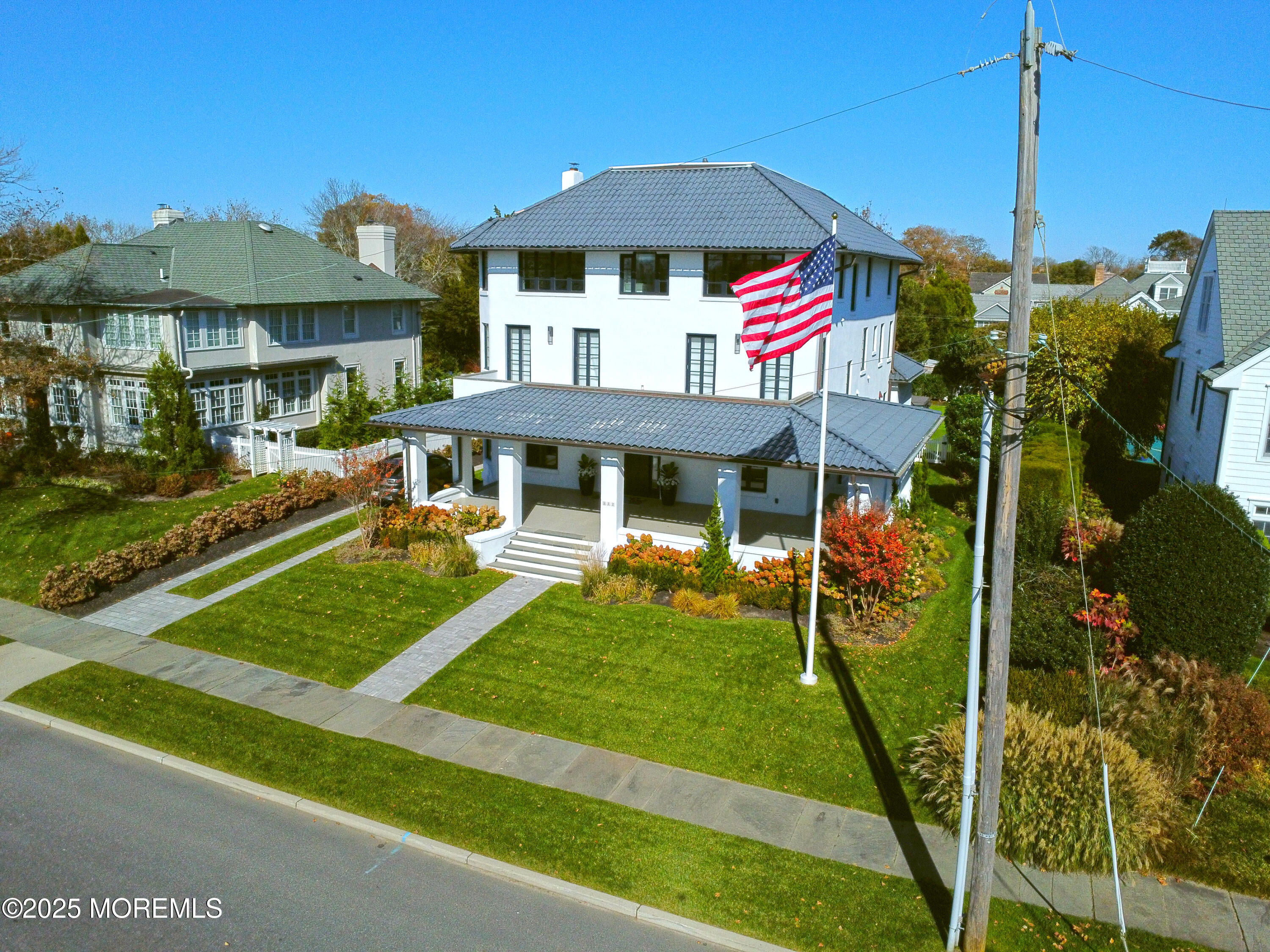 112 Passaic Avenue Spring Lake, NJ 07762 - Photo 69 of 69 a front view of a house with garden